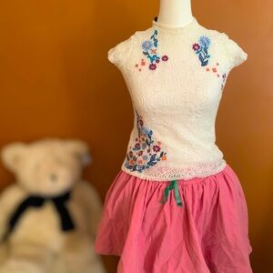 Mini Boden pink skirt; 
White blouse with flowers ; can be sold separately.